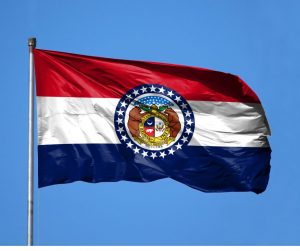Missouri-state-flag-flying-in-the-wind-300x251